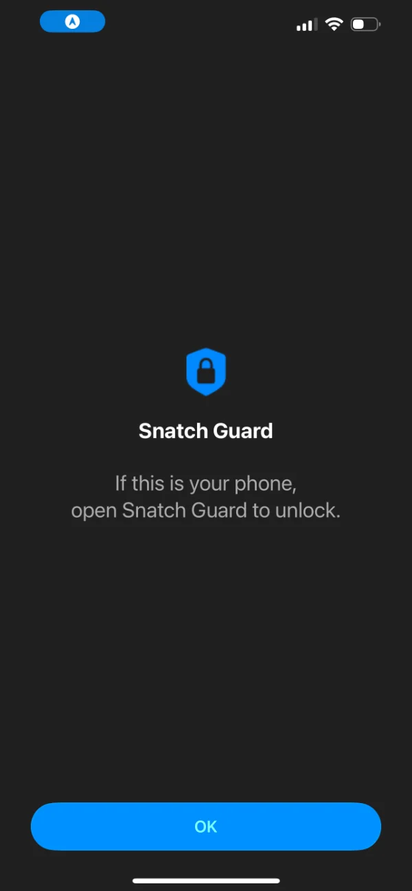 OS-level shield overlay covering a locked app